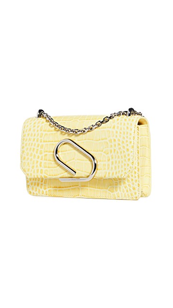 the best luxury designer handbags in the color yellow this season
